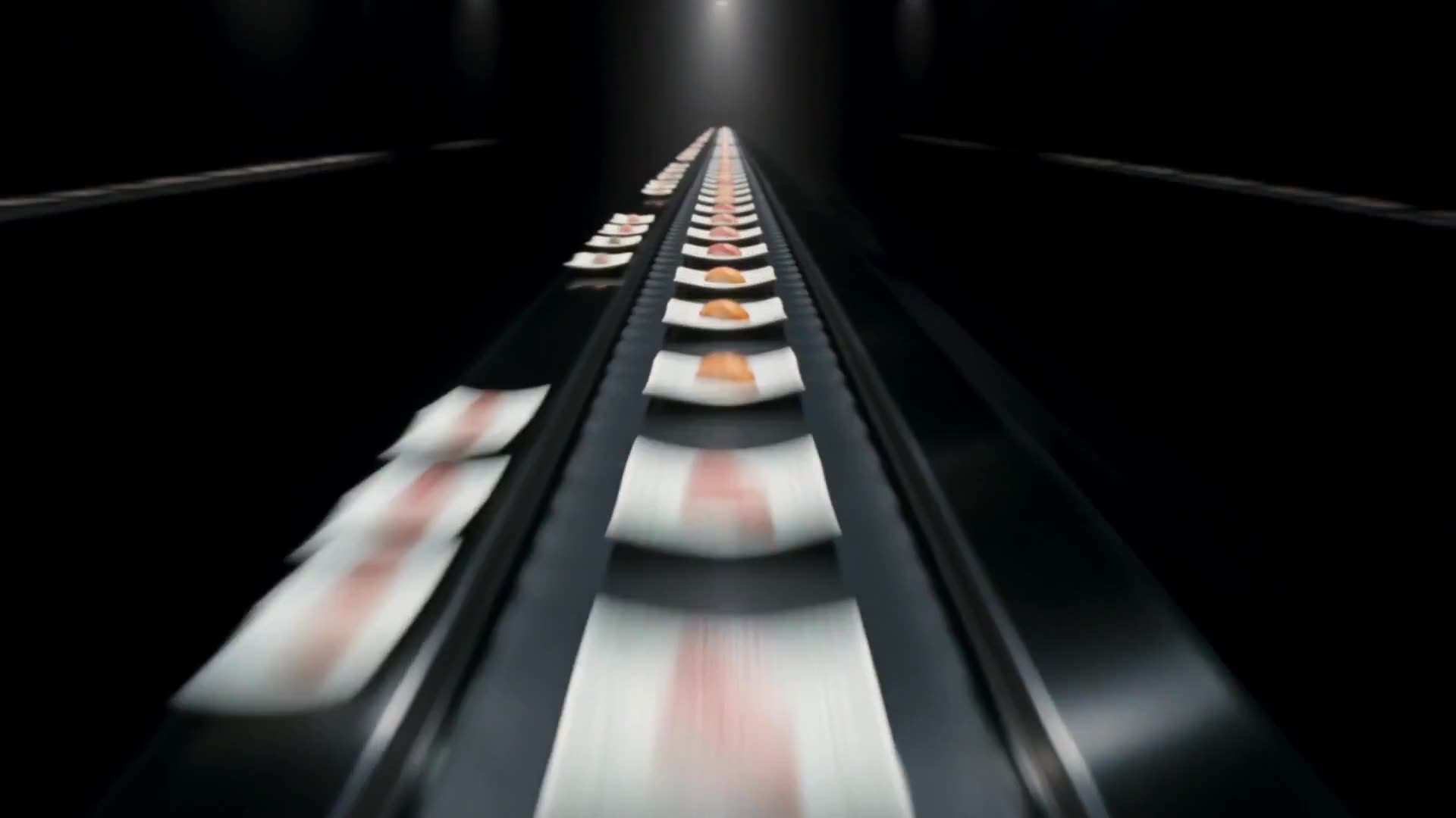 A plate of nigiri travelling along the revolving belt